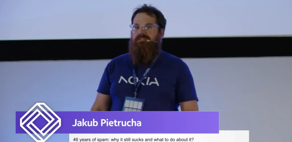Jakub Pietrucha, a software engineer, talking about SPAM at code::dive conference in Wroclaw